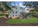 An exterior shot displaying a well-kept backyard with a deck and stairway feature at 745 Glengate Pl, Atlanta, GA 30328