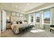 Serene main bedroom with tray ceilings, plush carpet, natural light and stylish decor at 6139 Wayburn St, Tucker, GA 30084