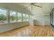 Relaxing sunroom with views of the lake, with hardwood floors and a comfortable atmosphere at 22 Waters Bridge Cir, Covington, GA 30014