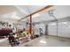 Spacious garage with two doors, tools, overhead lights, and ample storage space at 255 Maple Nw Ave, Marietta, GA 30064