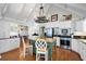 Spacious kitchen featuring stainless steel appliances, a green island, and lots of cabinets for storage at 255 Maple Nw Ave, Marietta, GA 30064