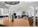 Open concept living room with vaulted ceilings, fireplace, and hardwood flooring at 255 Maple Nw Ave, Marietta, GA 30064