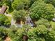 Aerial view of a home with mature trees surrounding the property at 3152 Ridgecrest Dr, Powder Springs, GA 30127