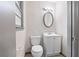 Bathroom featuring a toilet, vanity and mirror, and a window to let in sunlight at 3152 Ridgecrest Dr, Powder Springs, GA 30127