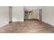 Inviting living area featuring new floors, neutral colors, and a modern lighting fixture, enhanced by natural light at 3152 Ridgecrest Dr, Powder Springs, GA 30127