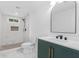 Stylish bathroom with a marble shower, mosaic tile floor, and modern vanity at 331 Highway 162, Covington, GA 30016