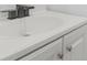 Bathroom vanity featuring a white sink basin and updated fixtures at 331 Highway 162, Covington, GA 30016