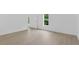 Bright, open bedroom with light wood flooring and natural light at 331 Highway 162, Covington, GA 30016