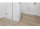 Hallway featuring neutral paint and wood-look flooring at 331 Highway 162, Covington, GA 30016