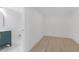 Hallway with view of the vanity and wood-look flooring at 331 Highway 162, Covington, GA 30016