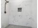 Beautiful walk-in shower with white marble tile and a built-in niche at 331 Highway 162, Covington, GA 30016