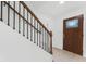 Stairwell featuring wood and iron railings at 331 Highway 162, Covington, GA 30016