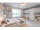 bedroom featuring shelving and a painted accent wall at 335 Wilma Sw Ct, Atlanta, GA 30331