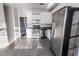 Modern kitchen featuring stainless steel appliances and tile flooring at 335 Wilma Sw Ct, Atlanta, GA 30331