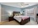 Cozy bedroom with hardwood floors, a window view, and stylish decor at 3895 Old Atlanta Station Se Dr # 1, Atlanta, GA 30339