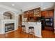 Stylish eat-in kitchen featuring cherry cabinets and a breakfast bar at 3895 Old Atlanta Station Se Dr # 1, Atlanta, GA 30339