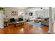 Cozy living room with lots of seating, natural light and hardwood floors at 3895 Old Atlanta Station Se Dr # 1, Atlanta, GA 30339