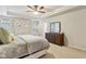 Bright bedroom with a large dresser, a ceiling fan, and a serene atmosphere at 3895 Old Atlanta Station Se Dr # 1, Atlanta, GA 30339