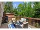 Relaxing patio with outdoor furniture, a grill, and a wooden fence at 3895 Old Atlanta Station Se Dr # 1, Atlanta, GA 30339