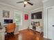 Office with a wood desk, aquarium, and baseball accents at 265 Haas Se Ave, Atlanta, GA 30316