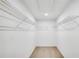Spacious walk-in closet with installed shelving provides ample storage space at 5773 Tillman Way, Powder Springs, GA 30127