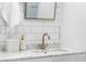Stylish bathroom with marble countertop, modern faucet, and subway tile backsplash at 1090 Shepherds Ne Ln, Atlanta, GA 30324