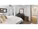 Primary bedroom features hardwood floors and ensuite bath with glass enclosed shower at 1090 Shepherds Ne Ln, Atlanta, GA 30324