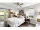 Bright bedroom featuring a ceiling fan and direct access to a private deck at 1090 Shepherds Ne Ln, Atlanta, GA 30324