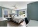 Bright bedroom with two windows, ceiling fan, and a comfortable queen bed at 1090 Shepherds Ne Ln, Atlanta, GA 30324