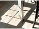 Light and shadow pattern on a hardwood floor under a dining table at 1090 Shepherds Ne Ln, Atlanta, GA 30324