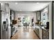 Spacious eat-in kitchen with stainless steel appliances and light gray cabinetry at 1090 Shepherds Ne Ln, Atlanta, GA 30324