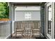 Inviting front porch featuring rocking chairs and a charming outdoor ambiance at 1090 Shepherds Ne Ln, Atlanta, GA 30324