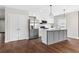 Stylish kitchen with stainless steel appliances, white cabinets, and center island at 1104 Oak Knoll Se Ter, Atlanta, GA 30315