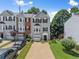 Charming townhome with well-maintained landscaping and a private driveway, offering curb appeal at 1628 Indian Way, Cumming, GA 30040