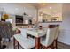 Chic dining room with stylish table, seating, and a view into the living area at 2587 Alvecot Se Cir, Atlanta, GA 30339