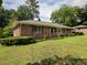 Classic brick exterior with a well-manicured lawn and established shrubbery at 286 Sequoia Ne Dr, Marietta, GA 30060