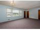 Bright living room with big windows and neutral carpeting at 286 Sequoia Ne Dr, Marietta, GA 30060