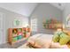 Vaulted ceiling bedroom with a playful decor and lots of natural light at 6181 E Fayetteville Dr, Riverdale, GA 30296