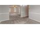 Dining room with a view into the living room area at 6181 E Fayetteville Dr, Riverdale, GA 30296