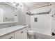 Modern bathroom featuring subway tiles, mosaic accents, and a marble countertop sink at 1404 N Crossing Ne Dr, Atlanta, GA 30329