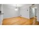 A bright, open dining area with hardwood floors and a modern light fixture at 1404 N Crossing Ne Dr, Atlanta, GA 30329