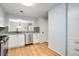 Well-lit kitchen features stainless steel appliances and light hardwood floors at 1404 N Crossing Ne Dr, Atlanta, GA 30329