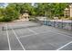 Well-maintained tennis court alongside community pool and other amenities, enhancing resident lifestyles at 1404 N Crossing Ne Dr, Atlanta, GA 30329