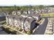 Aerial view showcasing the townhome's placement in a well-planned neighborhood at 1621 Wellborn Walk, Suwanee, GA 30024