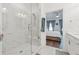 Modern bathroom featuring a spacious glass shower with marble tile and a view into the primary bedroom at 1621 Wellborn Walk, Suwanee, GA 30024