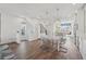 Bright dining area with modern table, seating, and stylish lighting fixtures at 1621 Wellborn Walk, Suwanee, GA 30024