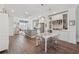 Open concept kitchen with an island, stainless steel appliances, and a built-in wine rack and refrigerator at 1621 Wellborn Walk, Suwanee, GA 30024