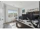 Office space featuring hard wood floors, natural lighting, and multiple monitors at 1621 Wellborn Walk, Suwanee, GA 30024