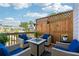 Cozy patio with comfortable seating, privacy fence, and charming decor at 1621 Wellborn Walk, Suwanee, GA 30024