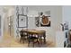 Dining area with stylish decor, modern art pieces, a wooden table and seating for four with pendant lighting at 560 Dutch Vly # 02313, Atlanta, GA 30324
